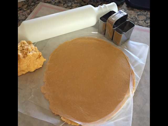 Making homemade baked cheese crackers